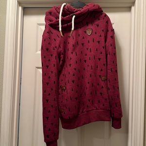 Dark red sweatshirt with trees